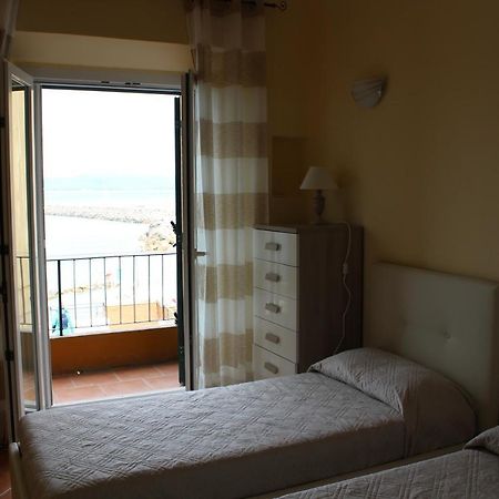 Апартаменты Casa La Marinella Порто Санто Стефано Экстерьер фото