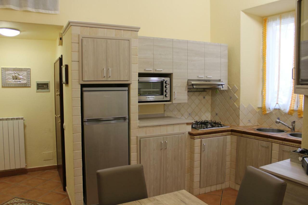 Апартаменты Casa La Marinella Порто Санто Стефано Экстерьер фото